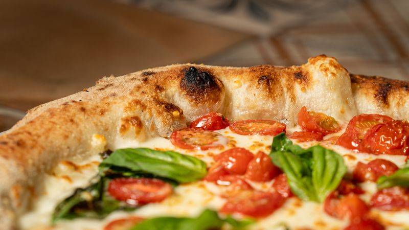 Signature round table pizza freshly baked